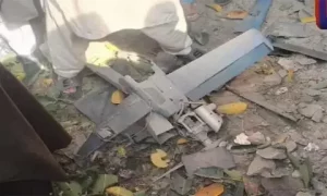 Security personnel at the scene following the suspected drone attack in Bajaur, Pakistan