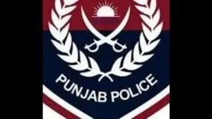 Citizen using Punjab Police online FIR check portal on a laptop in Pakistan