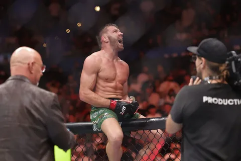 Dricus Du Plessis raises his fist in victory after defeating Kamaru Usman by unanimous decision at UFC Fight Night Oklahoma City, July 18, 2026.