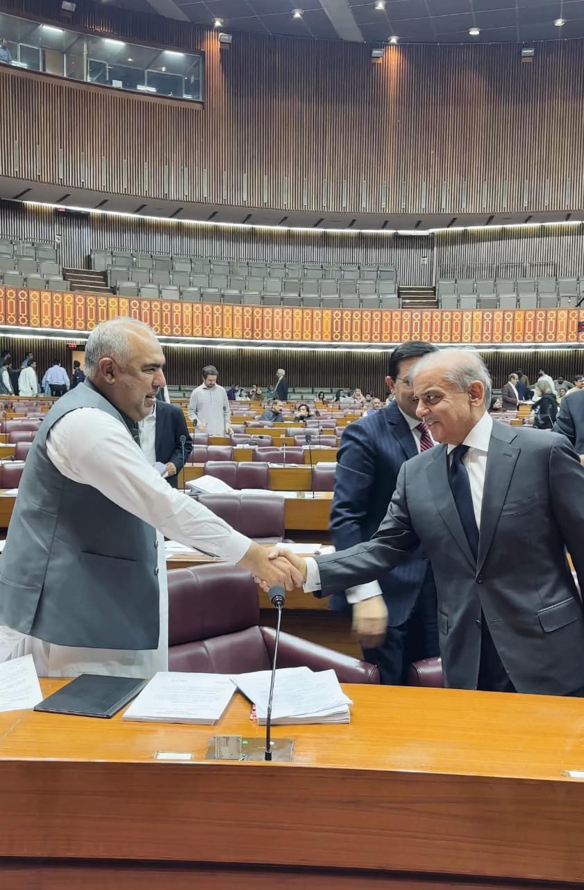 Prime Minister Shehbaz Sharif Greets PTI Leader Asad Qaiser in National Assembly