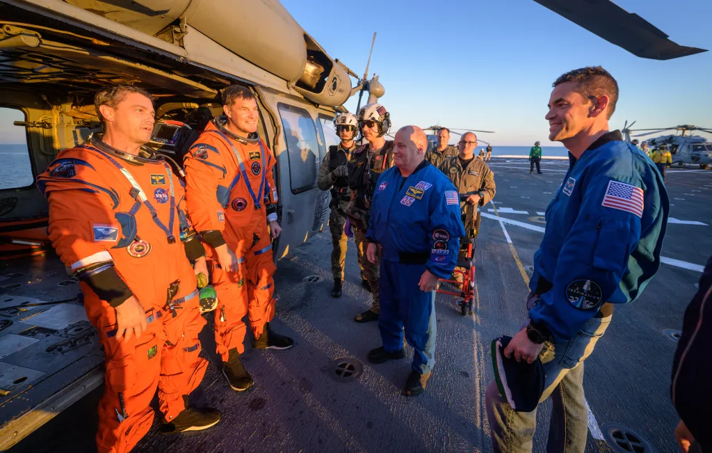 NASA Artemis II astronauts inside Orion spacecraft Integrity splashing down in the Pacific Ocean off San Diego coast on April 10, 2026, completing the historic moon mission