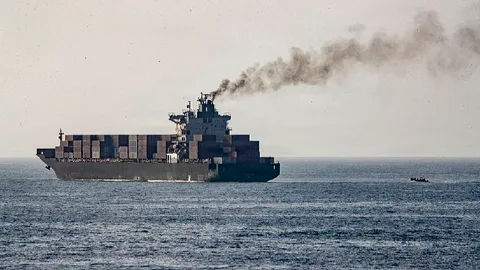 US Navy USS Spruance warship patrols Arabian Sea near seized Iranian cargo ship Touska during Strait of Hormuz blockade April 2026