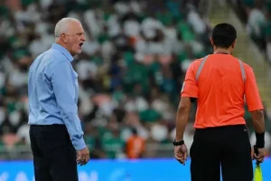 Iraq coach Graham Arnold celebrates with fans at Sydney Airport after Iraq World Cup 2026 qualification victory over Bolivia