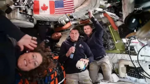 NASA Artemis 2 rocket launching from Kennedy Space Center on April 1, 2026, carrying four astronauts on the first crewed Artemis moon mission