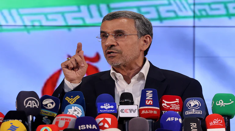 Former Iranian President Mahmoud Ahmadinejad at a public event, who was secretly chosen by the US and Israel to lead post-war Iran in 2026
