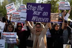 Pakistani women holding signs demanding enforcement of women protection laws Pakistan amid rising gender-based violence