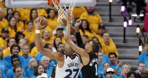 Anthony Edwards drives past Stephon Castle in NBA Semifinals Game 1 Timberwolves vs Spurs at Frost Bank Center, May 4, 2026