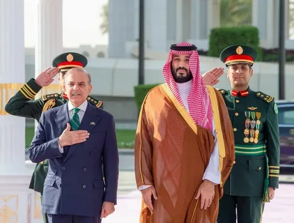 Pakistan and Saudi Arabia flags side by side representing their bilateral military and diplomatic agreement signed in 2025.