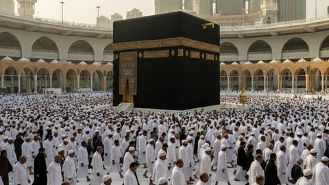 Pakistani pilgrims in white Ihram performing Tawaf around the Kaaba at Masjid al-Haram in Makkah during Hajj 2026 Saudi Arabia
