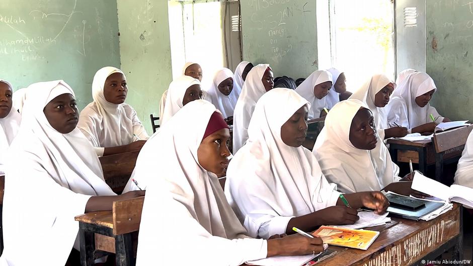 Nigerian women and girls attending classes and pursuing education to improve their future opportunities and economic independence.