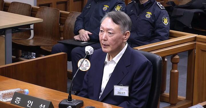 Former South Korean President Yoon Suk Yeol during a court appearance related to martial law and political investigations.