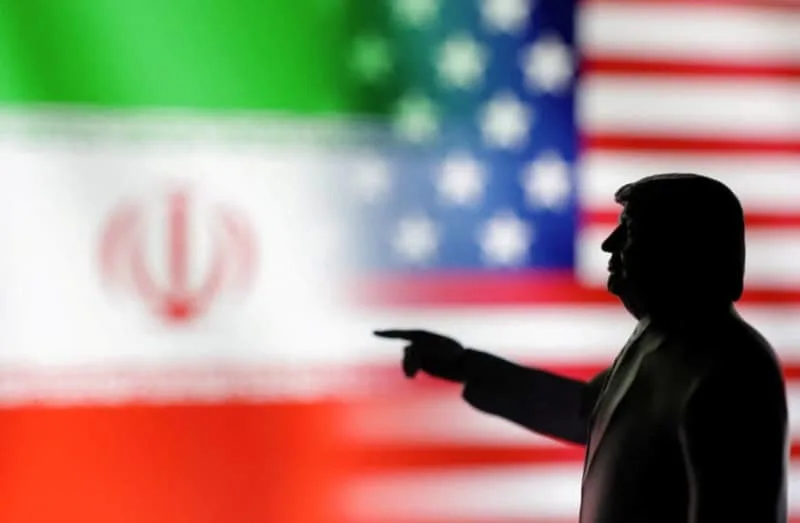US and Iranian diplomats at negotiating table representing the Trump Iran deal framework discussions and Iran MOU talks in 2026.