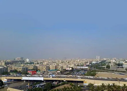 Skyline of a major Pakistani city showing rapid urban development and population growth.