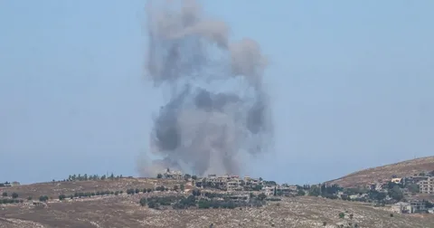 Smoke rises near the Israel-Lebanon border as ceasefire tensions continue amid regional security concerns.