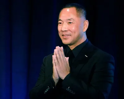 Guo Wengui appearing outside a US federal courthouse following developments in his high-profile fraud case.