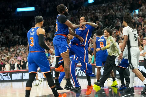 A tense NBA Finals scene showing the New York Knicks narrowly defeating the San Antonio Spurs in Game 2.