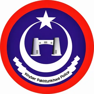 KP Police personnel standing during a security briefing as the force expands specialized units and public services.