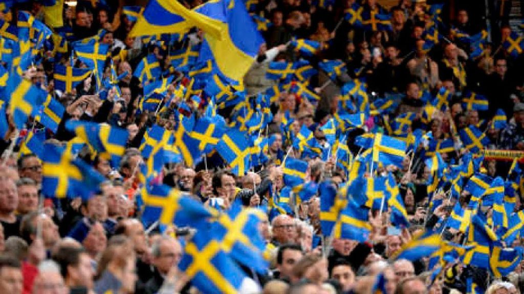 Swedish parliament building with political debate representing Sweden Democrats and current Swedish government dynamics in 2026.