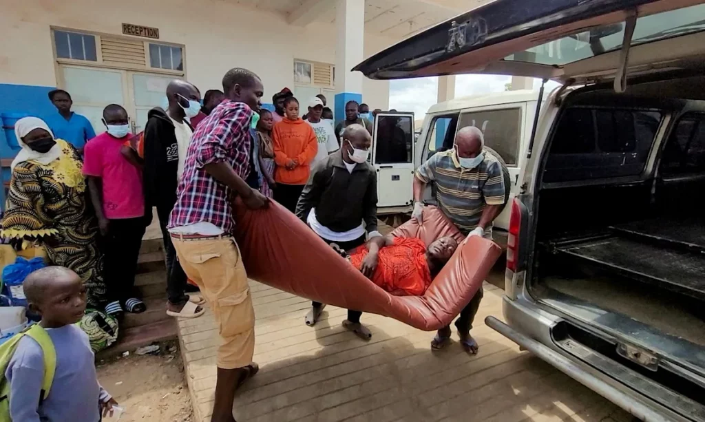 Health workers in protective gear treating patients at an Ebola treatment center in Ituri Province, DR Congo, during the 2026 Bundibugyo virus outbreak.