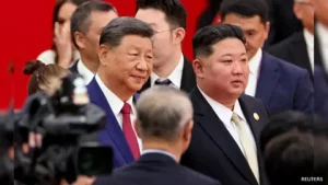 Chinese President Xi Jinping and North Korean leader Kim Jong-un highlighting the strategic partnership between China and North Korea.