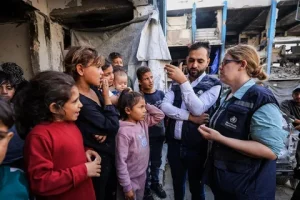 Gaza humanitarian update showing aid workers delivering emergency assistance to Palestinian civilians during a humanitarian crisis