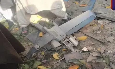 Security personnel at the scene following the suspected drone attack in Bajaur, Pakistan
