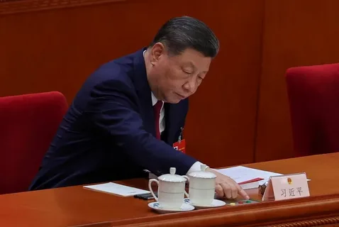 Chinese national flag displayed outside a government building following the introduction of the new Ethnic Unity Law