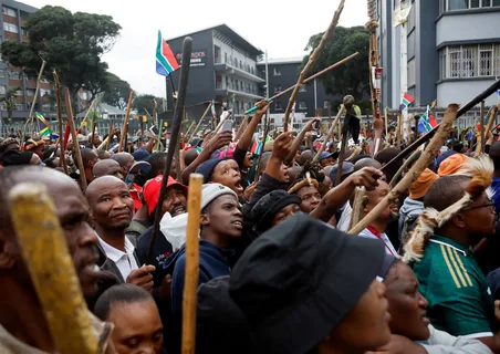 South African police officers monitoring anti-migrant protests during immigration enforcement operations