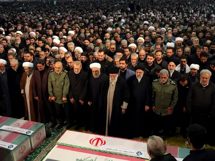 Mourners gather at Imam Khomeini Mosalla in Tehran during the funeral procession of Iran's assassinated Supreme Leader Ali Khamenei