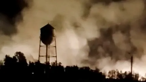 Smoke rises after US strikes on Iran as the Iran-Israel war intensifies and Houthi attacks target Saudi oil tankers.