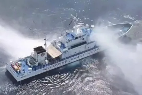 Philippine and Chinese coast guard vessels face off near Scarborough Shoal amid water cannon attacks in the South China Sea.