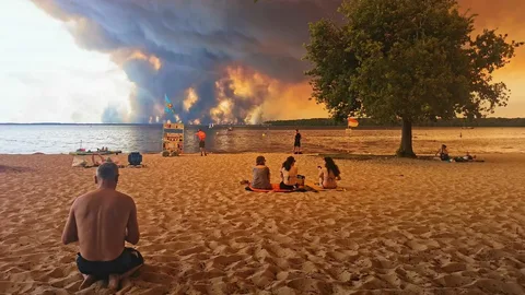 Wildfires raging across France and Spain as firefighters battle flames and thousands of residents evacuate under emergency orders.