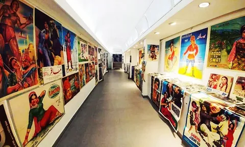 Visitors exploring paintings at PNCA Islamabad art exhibition 2026 inside the National Art Gallery