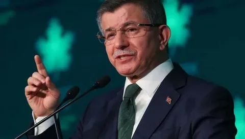 Former Turkish Prime Minister Ahmet Davutoglu speaking at a political event before announcing his retirement from politics and the dissolution of the Future Party.
