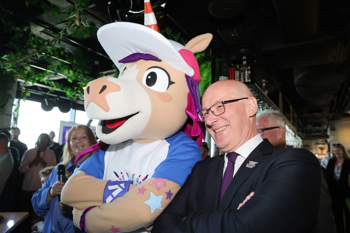 Athletes compete under the Commonwealth Games 2026 banner at Glasgow's Scotstoun Stadium