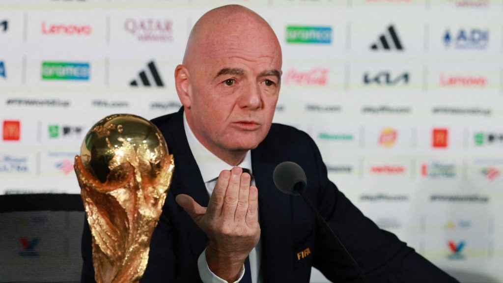 FIFA President speaking at a football conference as UEFA challenges the governing body's World Cup investment plan.
