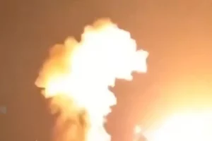 Smoke rises following reported US strikes on targets in Iran amid escalating Strait of Hormuz tensions.
