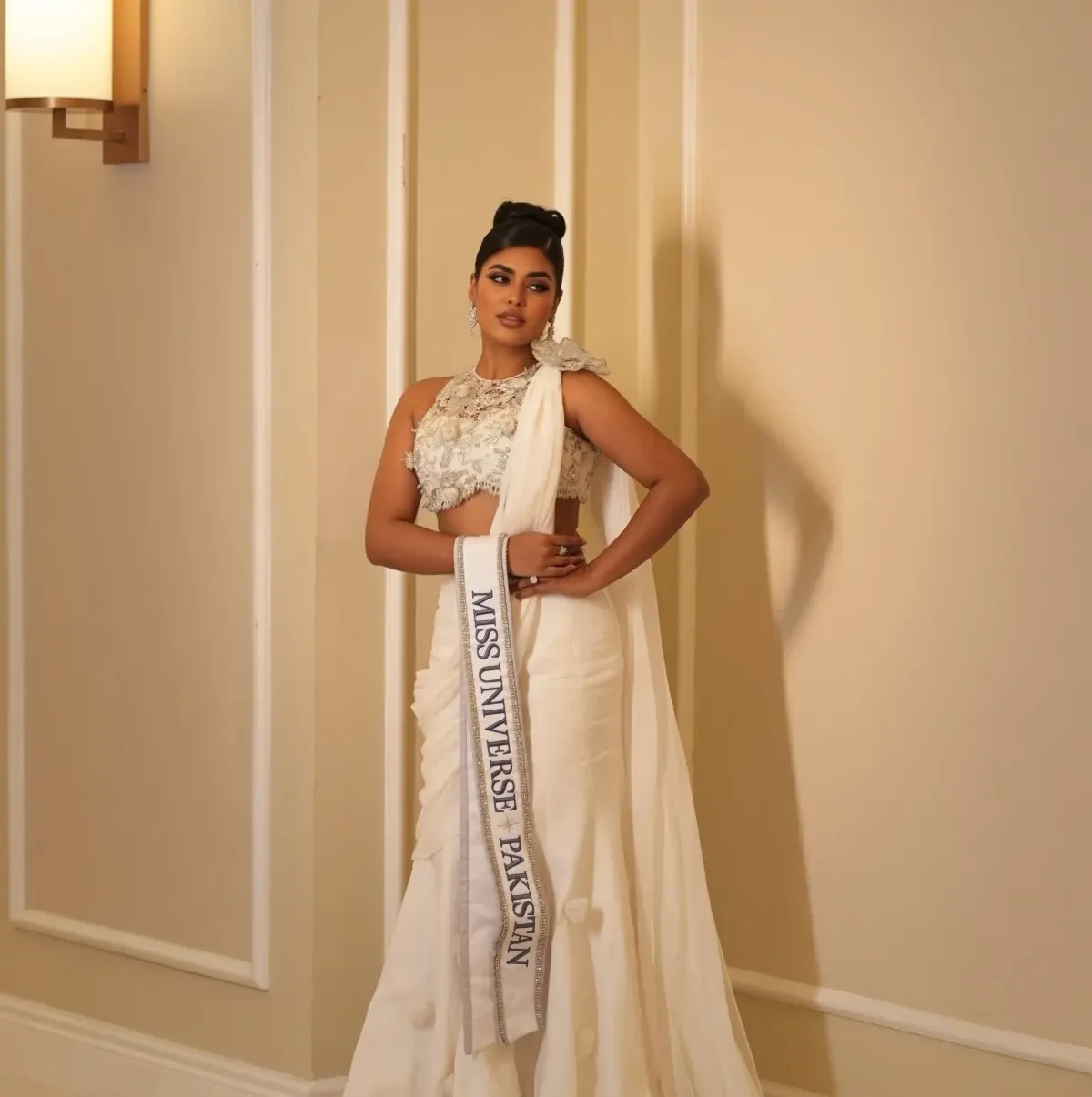 Roma Riaz smiling in national dress as she is announced National Director of Miss Universe Pakistan