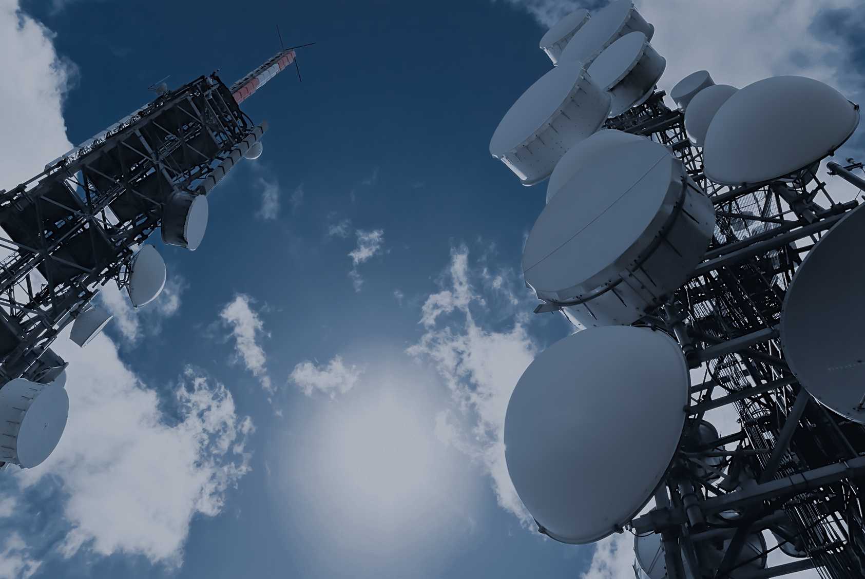 Telecom tower against a Pakistani skyline representing G2G agreements in the IT sector