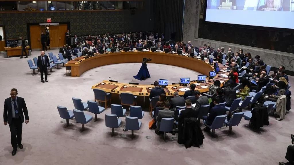 United Nations Security Council chamber with member state delegates seated at the horseshoe table