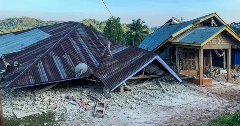 Collapsed building and rubble after the 7.7 magnitude earthquake Indonesia disaster on Flores Island