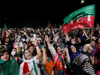 PTI and TLP supporters protesting on the streets of Islamabad during Pakistan's ongoing political crisis