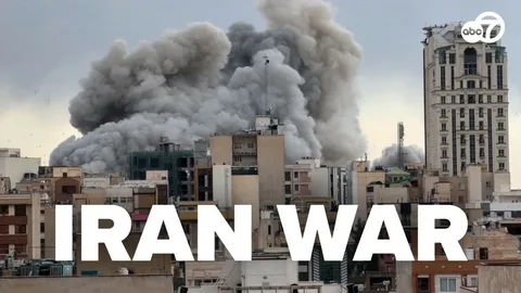 Pakistan and Iran flags side by side representing Iran war news and Pakistan Iran diplomatic relations 2026