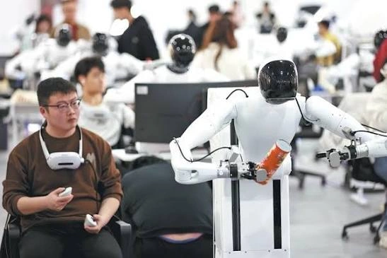 Chinese humanoid robot Wuji guiding schoolchildren at a robotics school