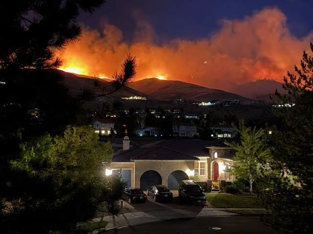 Hawk Fire burns across Northern Nevada hillside near Reno as flames spread rapidly