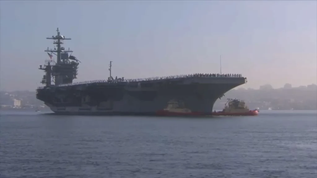 : USS Abraham Lincoln aircraft carrier at sea during extended Middle East deployment