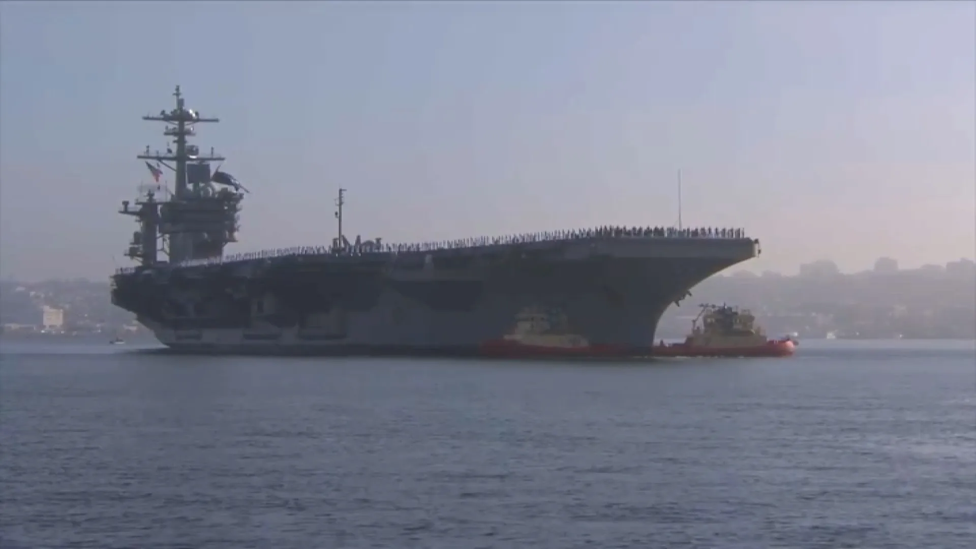 : USS Abraham Lincoln aircraft carrier at sea during extended Middle East deployment