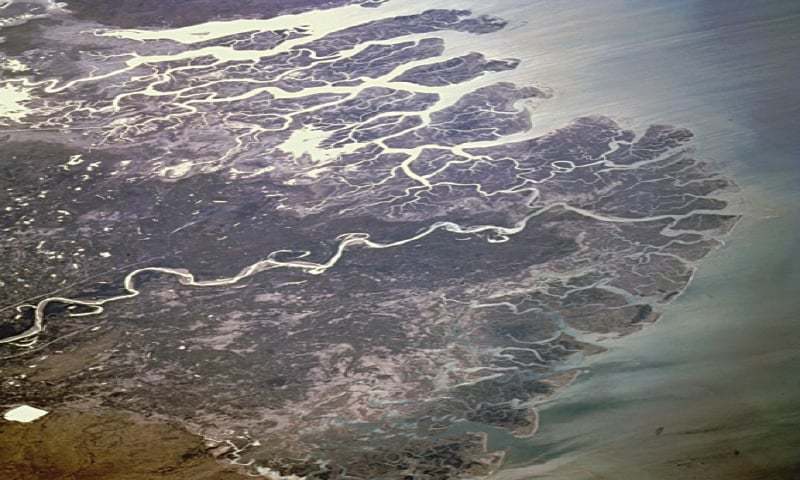 Cracked, dried-up land of the Indus Delta in Sindh, Pakistan, showing coastal erosion near Thatta and Sujawal