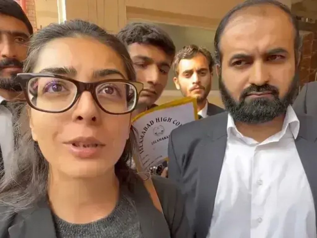 Lawyers Imaan Mazari and Hadi Ali Chattha outside an Islamabad court following their rearrest