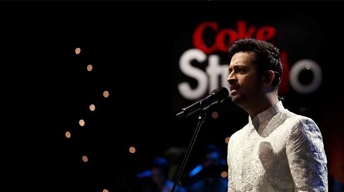 Atif Aslam performing on stage during a Coke Studio Pakistan session